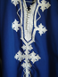 Jocelyn's royal blue cotton shirt 
with white embroidery