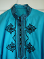 Jocelyn's turquoise shirt 
with black embroidery